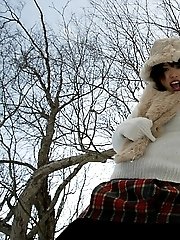 Hitomi Hayasaka naughty Asian teen shows ass and pees in the snow